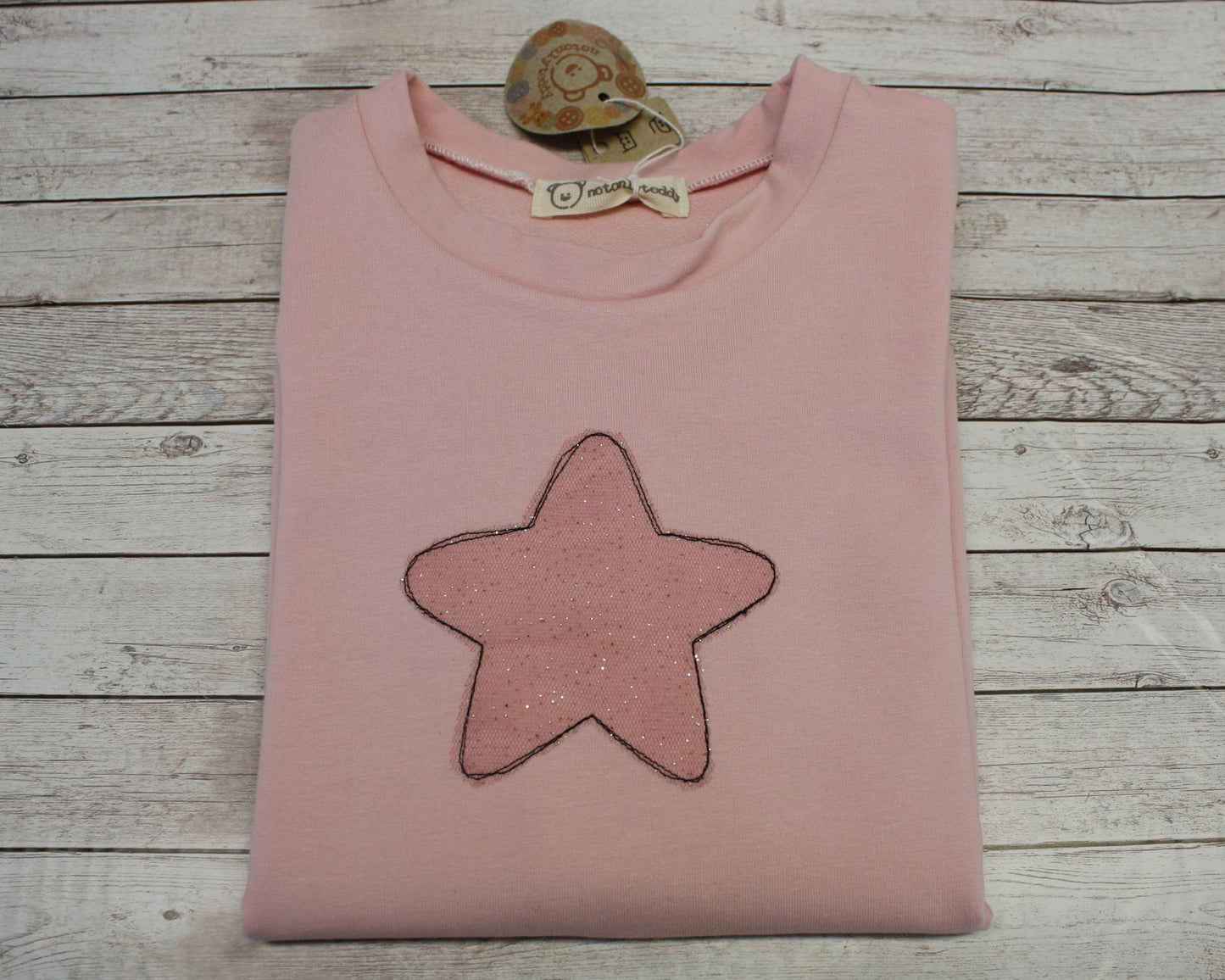 Felpa garzata rosa con stella in tulle rosa glitterata