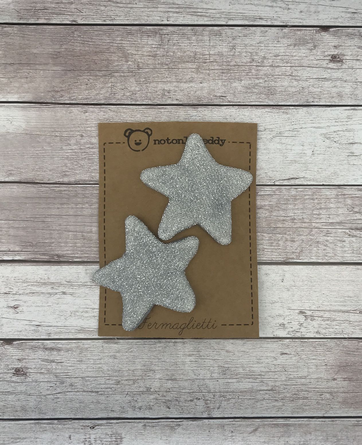 fermaglietti a forma di stella in maglina glitter argento