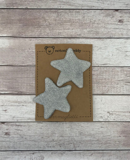 fermaglietti a forma di stella in maglina glitter argento