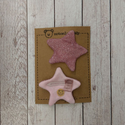 fermaglietti a forma di stella in maglina glitter rosa - davanti e dietro