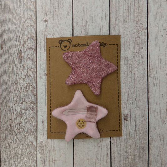fermaglietti a forma di stella in maglina glitter rosa - davanti e dietro