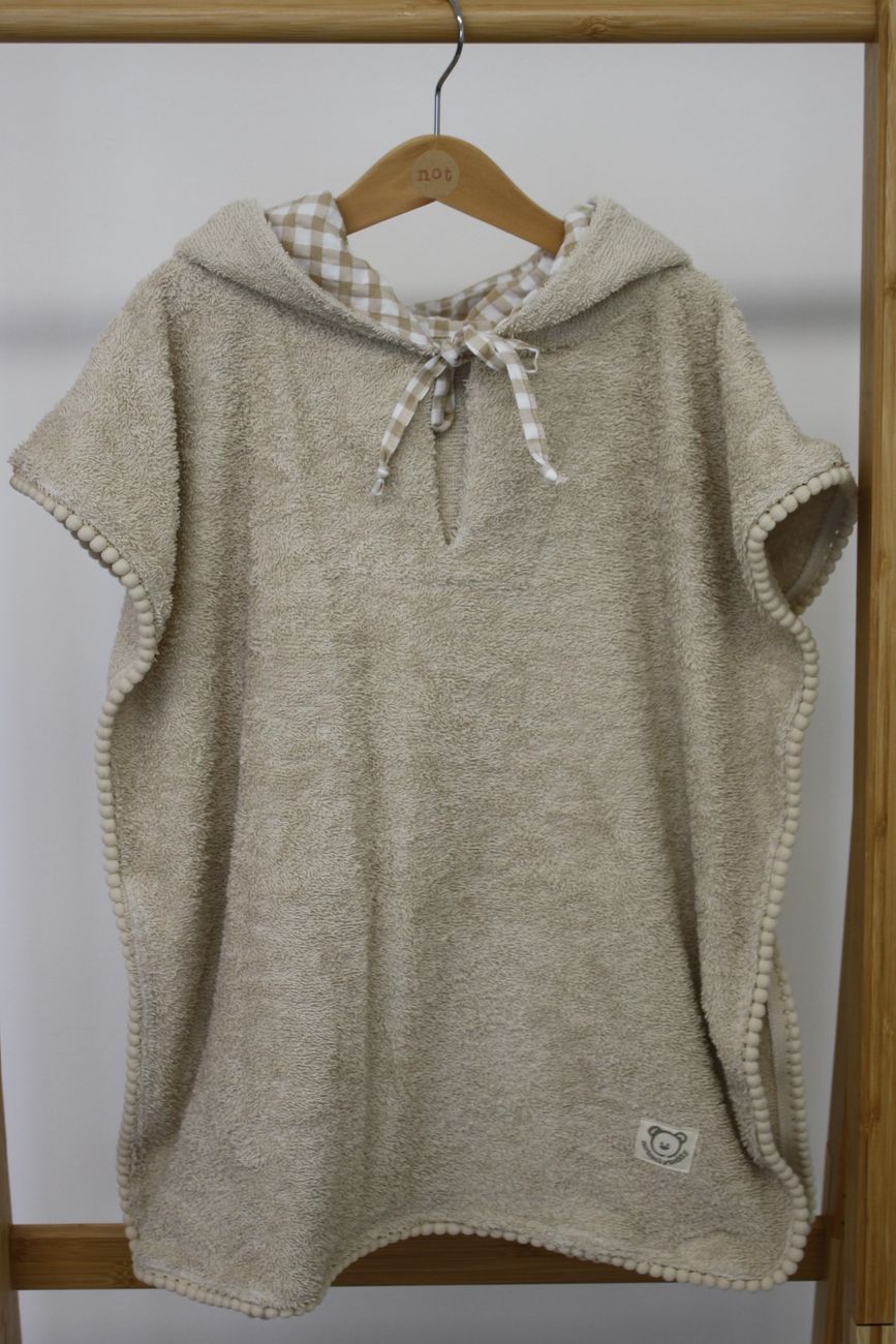 poncho bambina per la spiaggia, spugna beige e tessuto a fiori