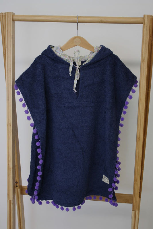 poncho bambina per la spiaggia, spugna blu e tessuto a fiori