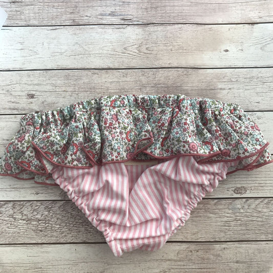 Retro di costumino bambina con volant righe rosa e fiorellini