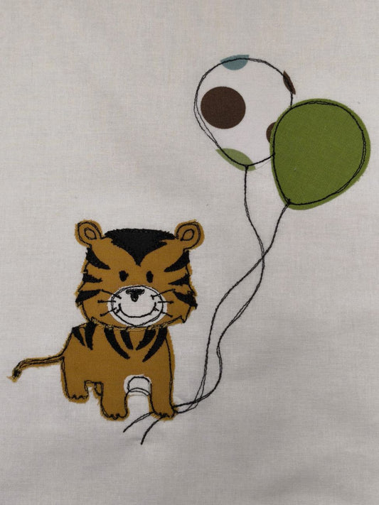 Sacchetto semplice bianco e grigio a pois con decorazione di tigrotto