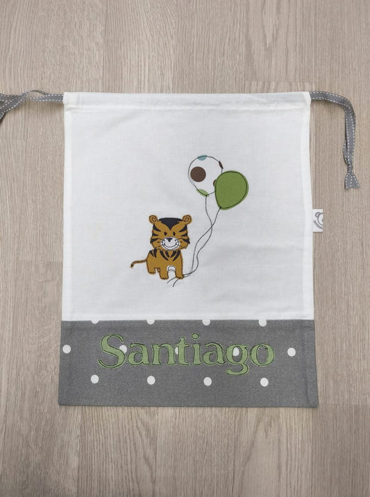 Sacchetto semplice bianco e grigio a pois con decorazione di tigrotto