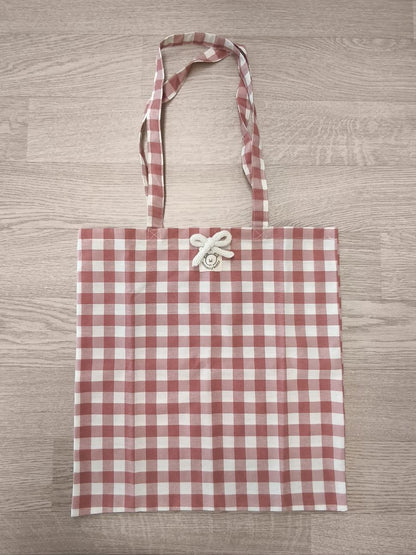 Shopper donna in tela a quadri rosa con spilla